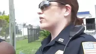 Two very horny female police officers take turns on black man's large penis